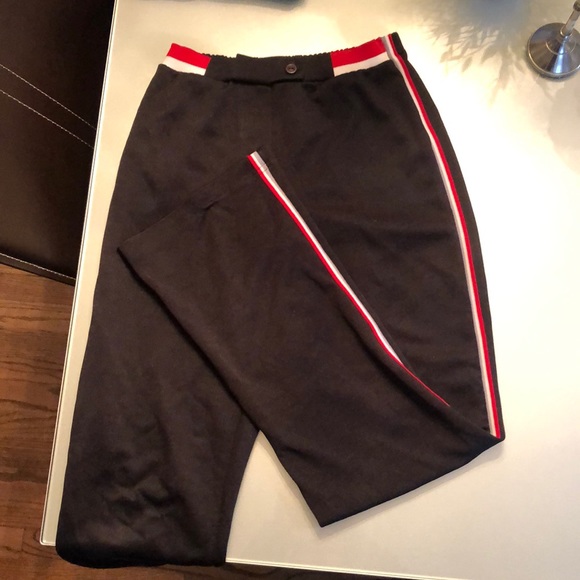 black sweatpants with red and white stripe
